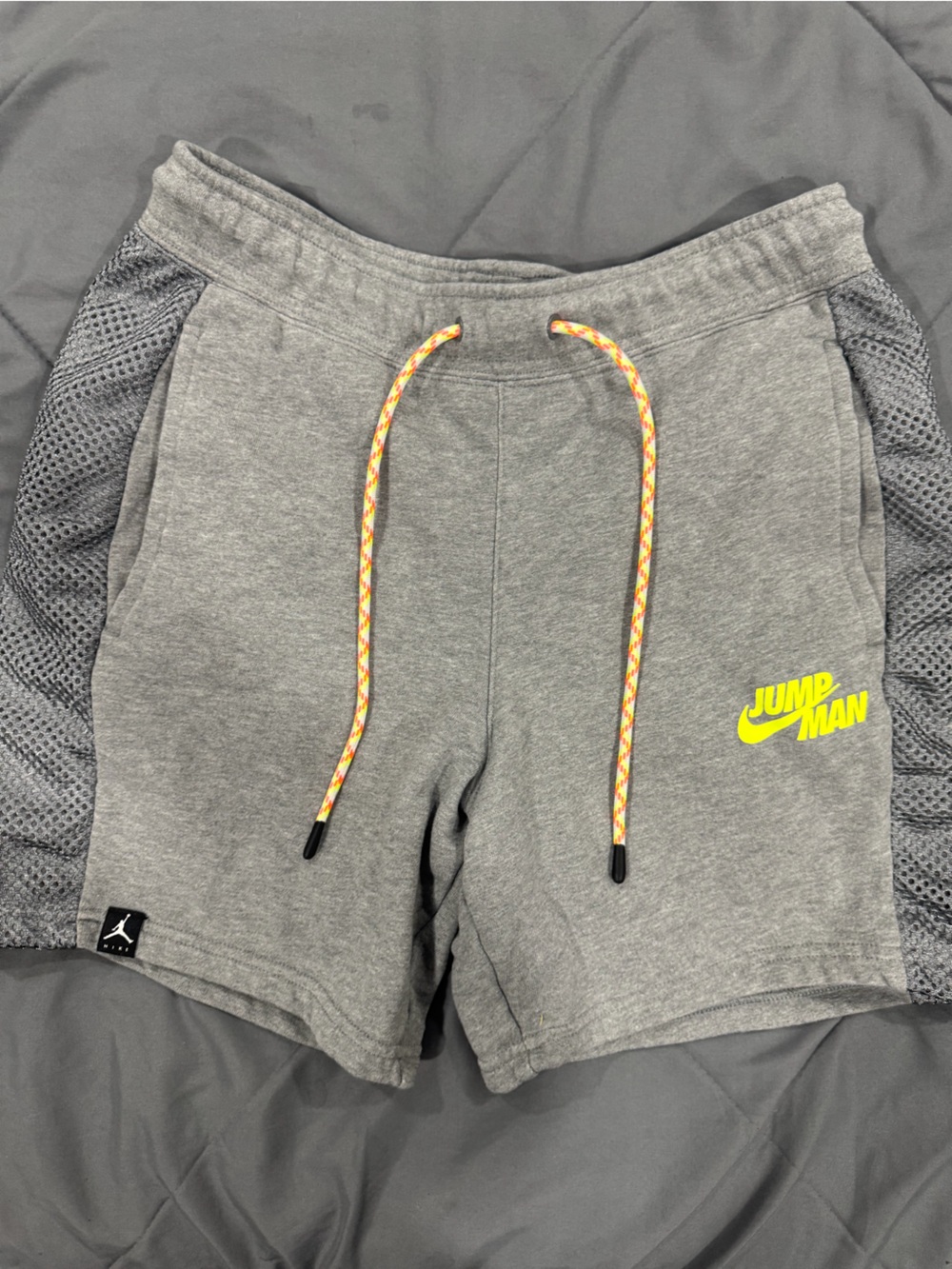 Jordan Men’s Grey Athletic Shorts with Neon Yellow Logo and Orange Drawcord